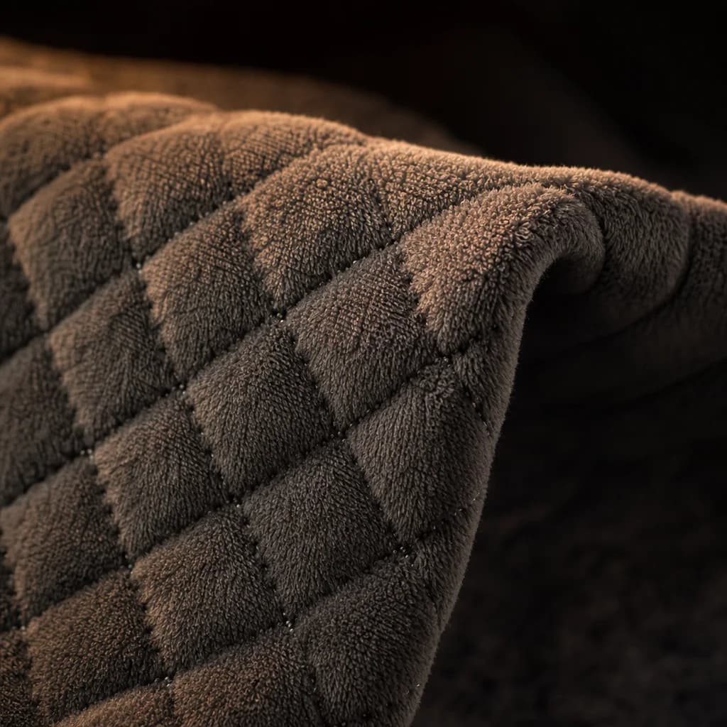 Close-up of the quilted micro-plush surface of the heating pad